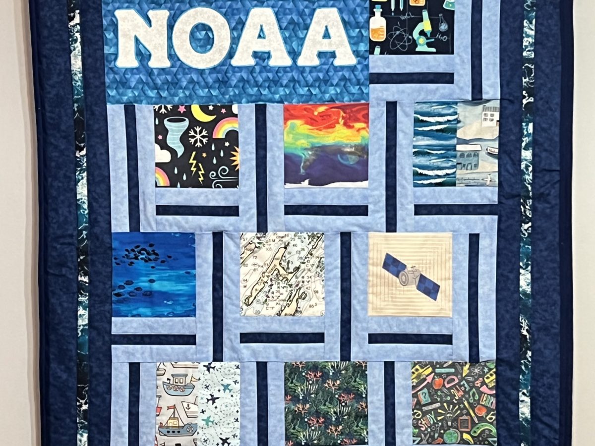 NOAA quilt featuring patches of individual artwork pieces