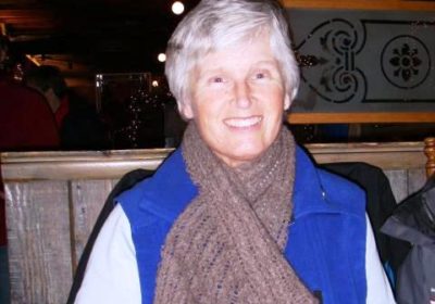 Woman wearing a knit scarf