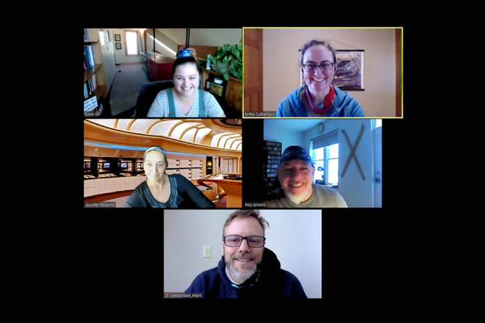 Five people participating in a Zoom meeting.